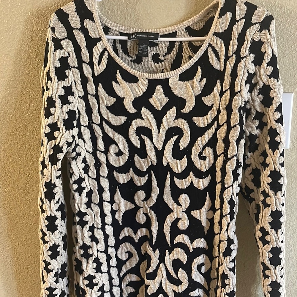 Beautiful black and Beige sweater dress with a hint of gold sparkles